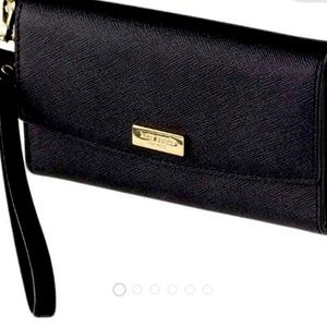 Used Kate spade wristlet iPhone wallet case.